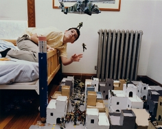 Boy in his bedroom with model of Kandahar, Afghanistan, Watertown, MA, 2001