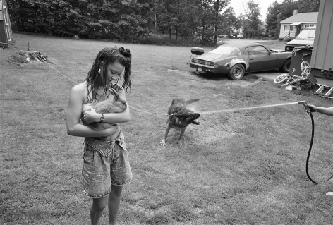 Girl with rabbit and German Shepherd, Laconia, New Hampshire, 1992